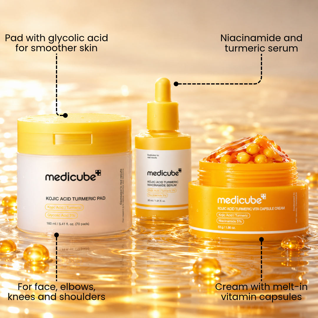 Medicube Kojic Acid Turmeric pad, serum and capsule cream on golden water