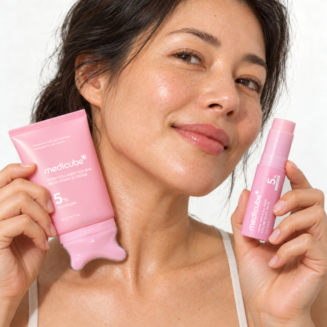 Woman holding the Medicube PDRN Collagen Gua Sha Neck Cream and the Volume Multi Balm stick