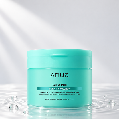 Anua PDRN Hyaluron Glow Pad jar standing in clear water on a light studio background