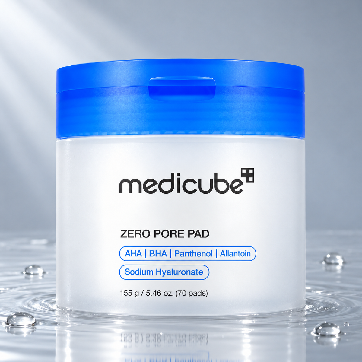 Medicube Zero Pore Pad jar standing in clear water on a light grey studio background